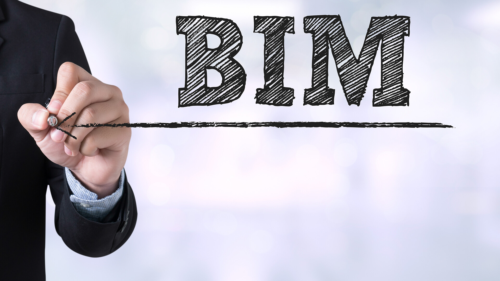 Personas escribiendo la palabra BIM Personas escribiendo la palabra BIM