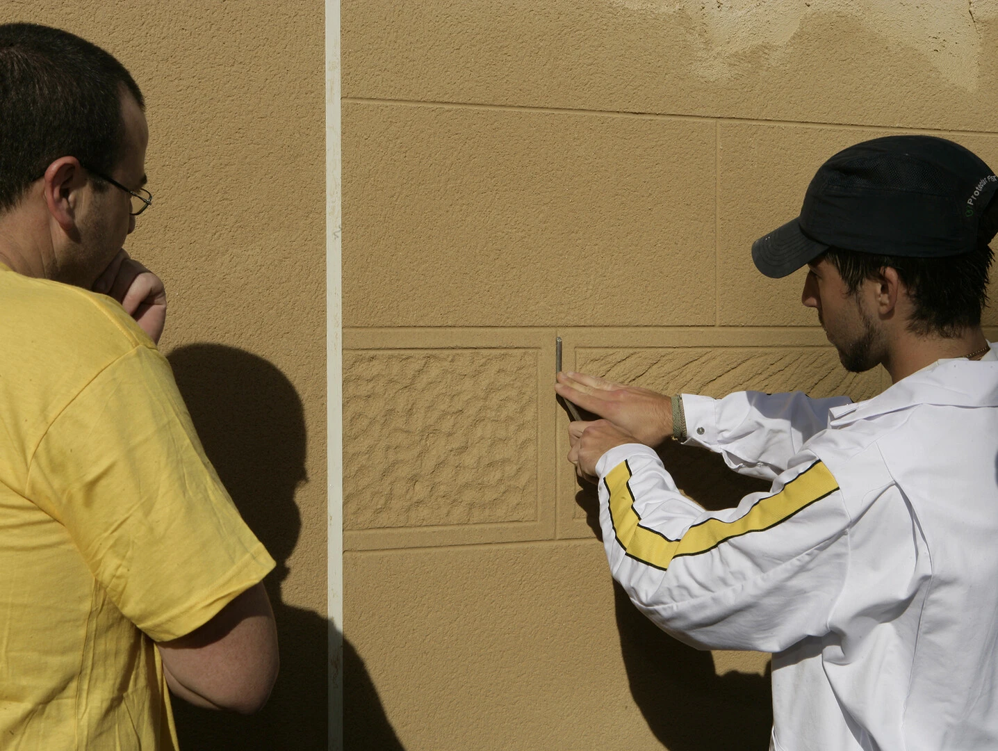 Profesional formando en soluciones de fachada Profesional formando en soluciones de fachada