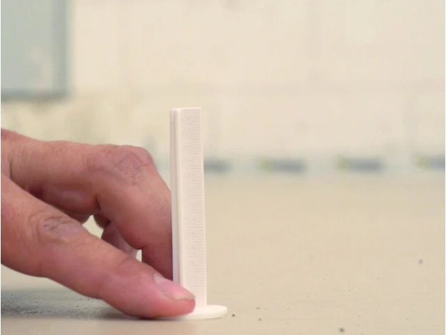 Marcador adhesivo para cotas de nivelación