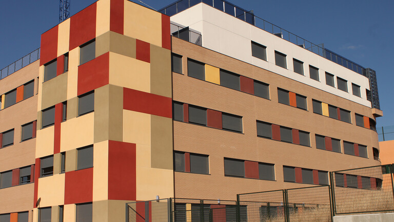 Edificio de viviendas realizado con un revestimiento continuo weberpral prisma Edificio de viviendas realizado con un revestimiento continuo weberpral prisma