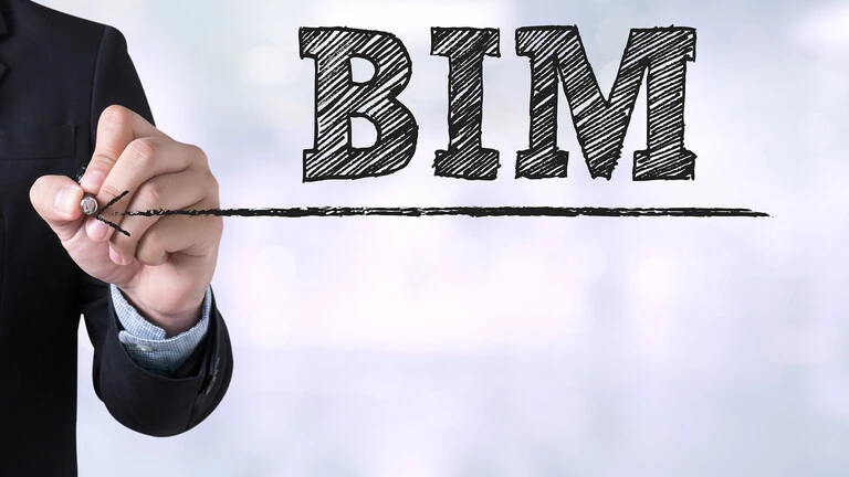 Personas escribiendo la palabra BIM